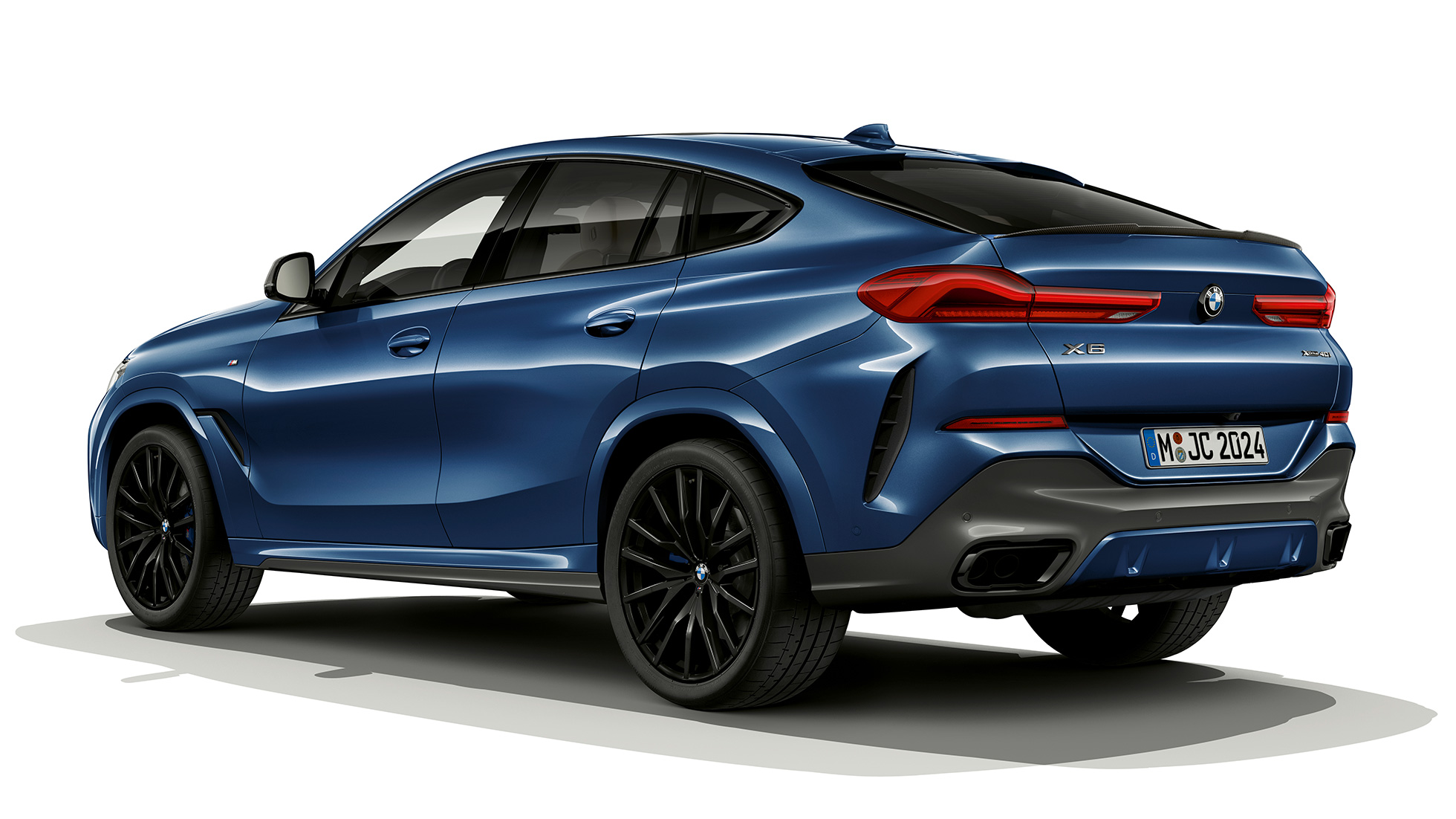 BMW X6 with M Sport package in three-quarter rear perspective.